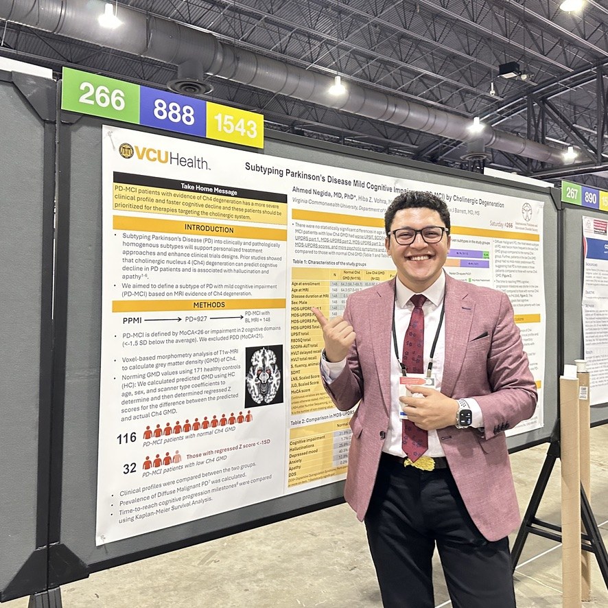 Ahmed Negida presenting a poster on PD-MCI Ch4 subtyping at the MDS Congress 2024